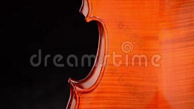 黑色背景下小提琴或<strong>中提琴</strong>的身体细节